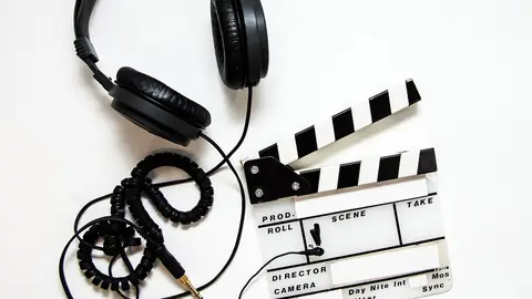 Photo: headphones, clapper, clapperboard